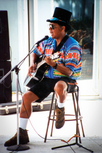 Paul Buster plays guitar